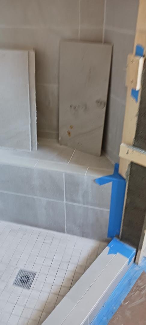 Repairs that Christi Galla had to do. The repairs to the Master Bathroom that needed to be done to install a glass door in the shower