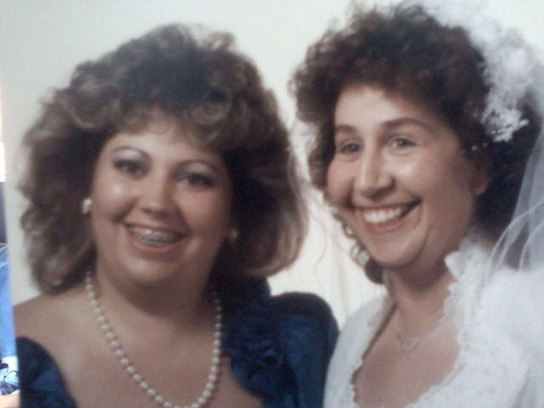 Me and my sister at her wedding in June 1987