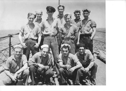 Taken sometime during WW II in the South Pacific..My dad is on the left standing second row..