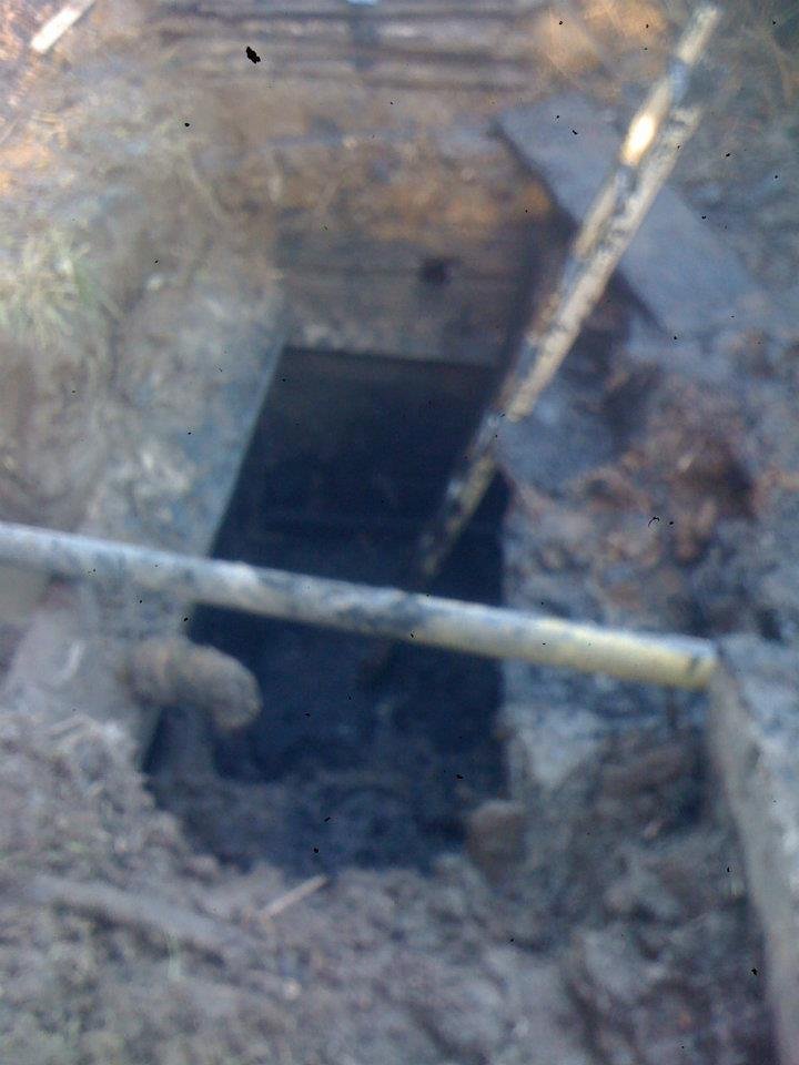 old tank has been dug out by shovel and bucket!