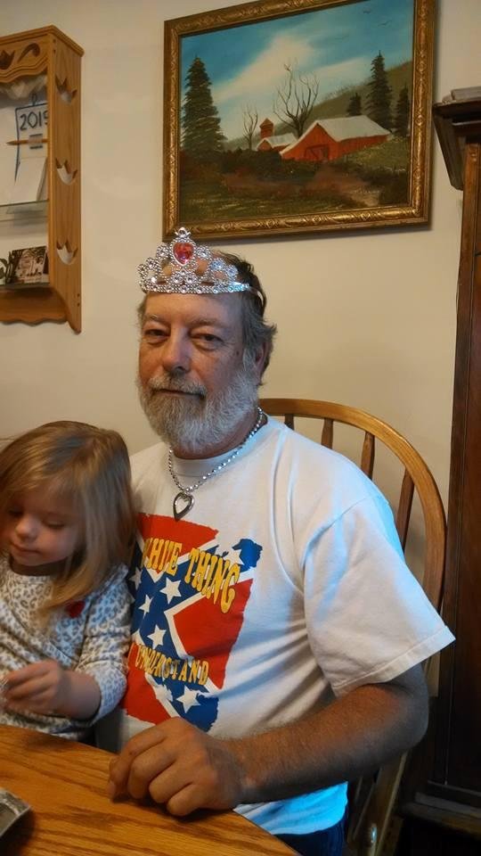 Ed Cain--- playing with granddaughter