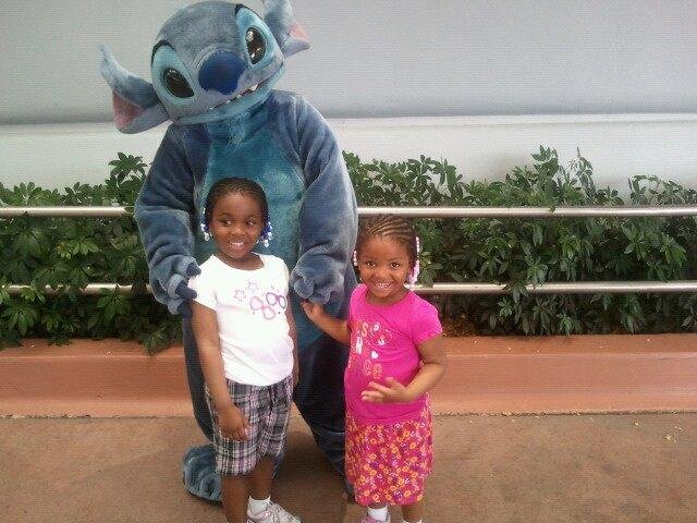 Girls w/ "Stitch from Lilo & Stitch".
