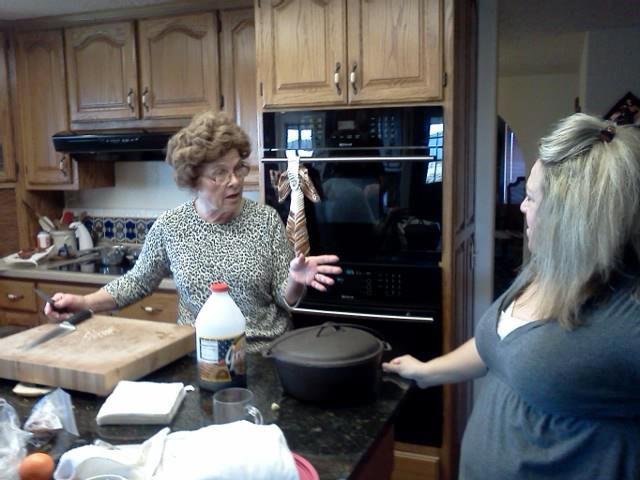Mom explaining to Lori how to cook in a Dutch Oven....