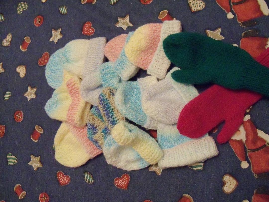 Baby hats for Caps for Good, mittens for Afghans for Afghans. Now I just have to finish Justin's sweater!