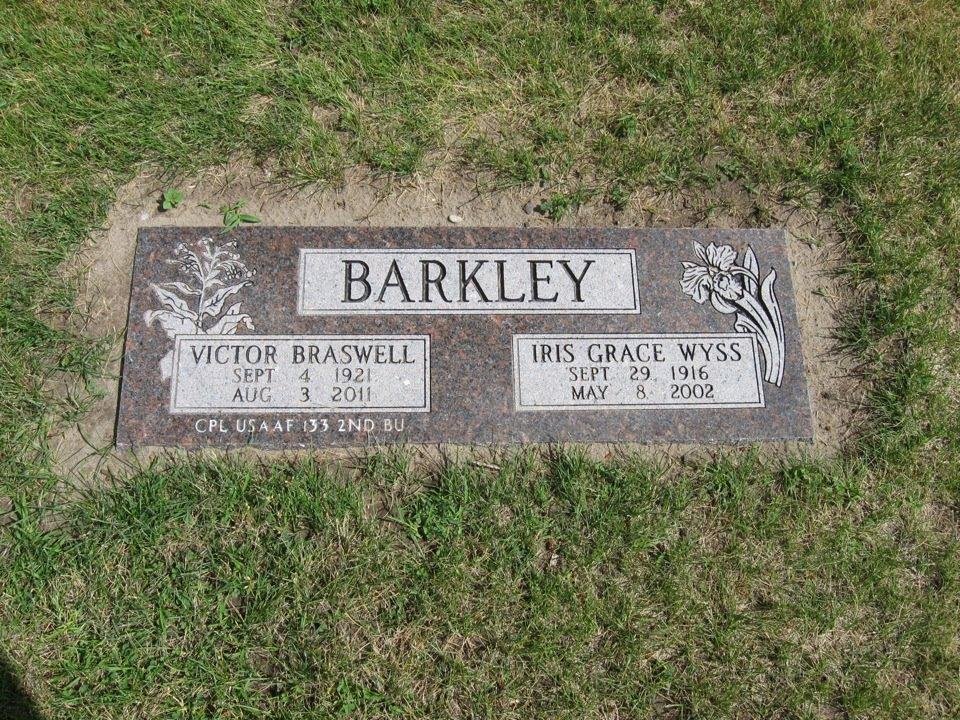 Mom and and Dad's grave marker is finally complete.  The flower on the right is an Iris.  Dad's military service is at the lower left.  They are missed.