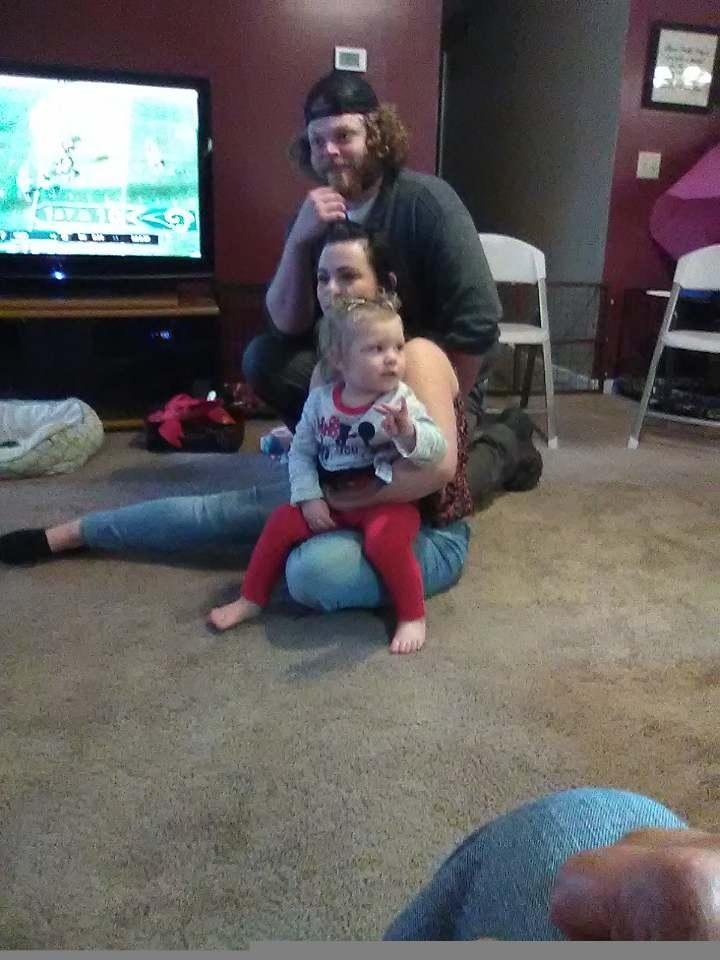 my oldest great grandaughter with her mom and dad at her 2nd birthday party. had a great time.