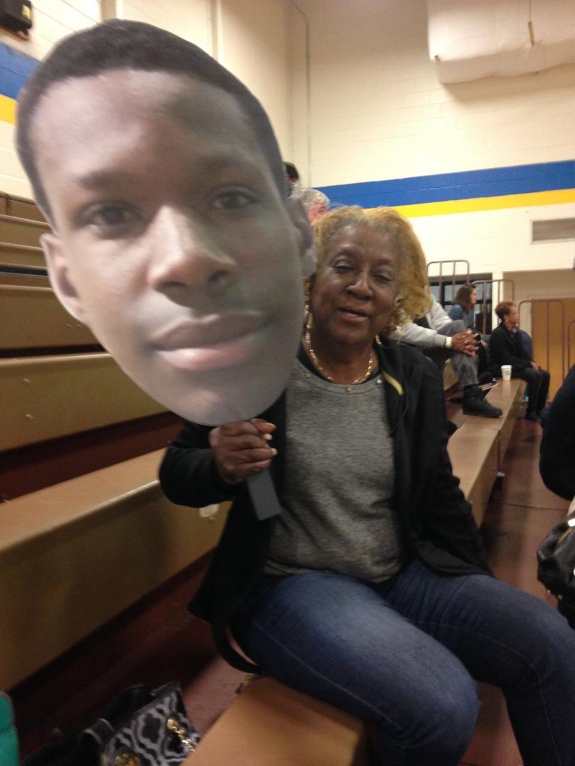 My mom holding up her grandson LJ at the AAU Basketball Tournament! Proud grandma! Go LJ!