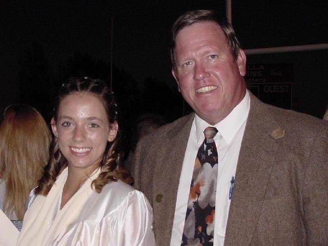 Dad and Laura at Laura's middleschool graduation 2002.