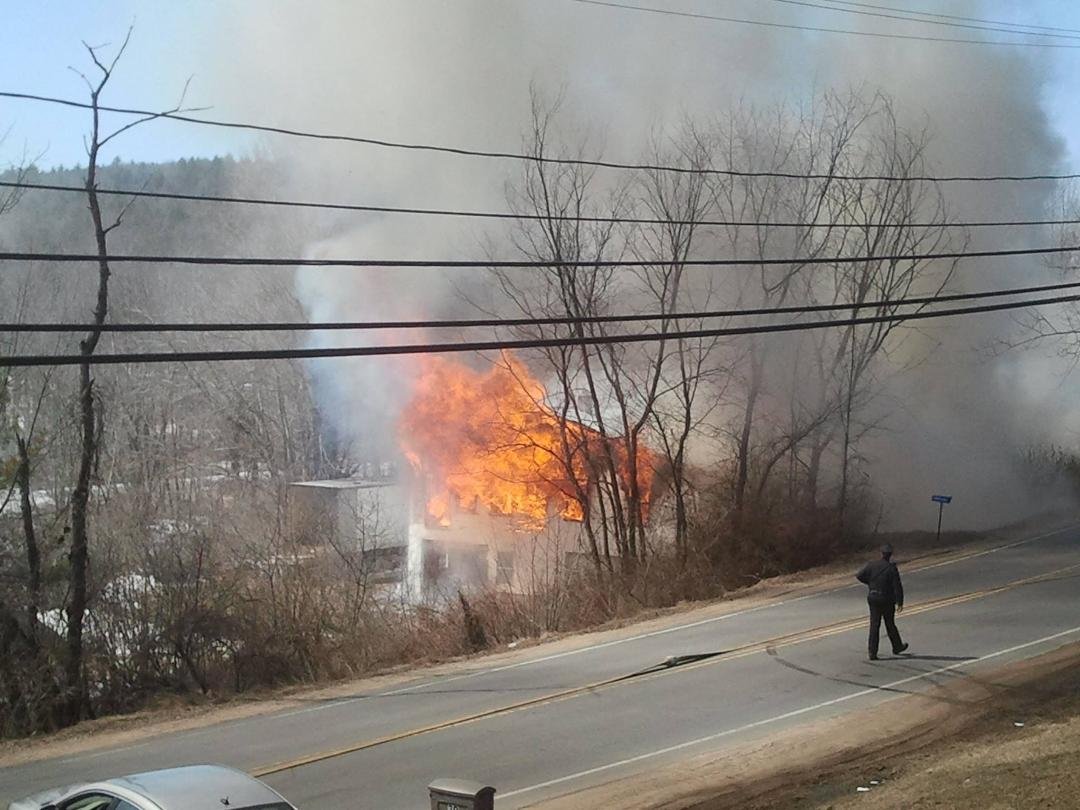 Fast winds made this house disappear in lest that 15 minutes.  14 Fire trucks from 5 or 6 towns.  Glad no one was hurt.  The bright side.  I now have a view.  LOL