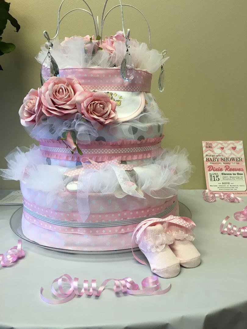 I made this diaper cake for a gift for a baby shower.