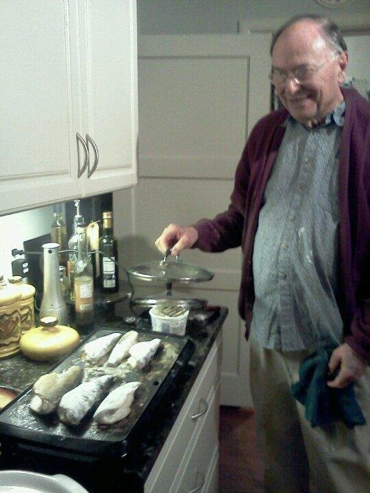 Dad frying rainbow trout