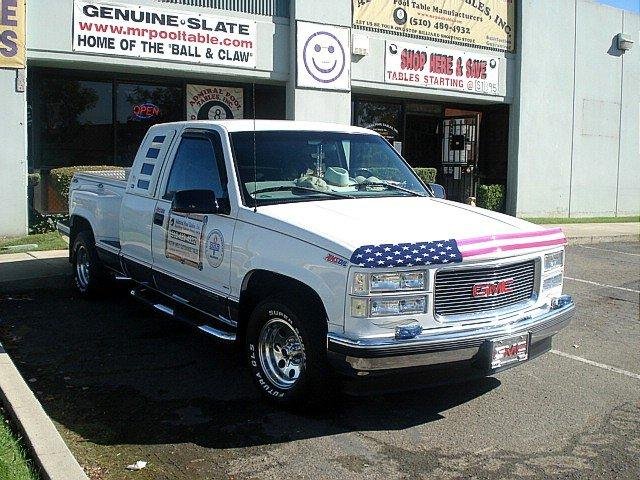 My 98' GMC Pickup in front of my business in Hayward, Ca.....I use my truck as a rolling advertisement...