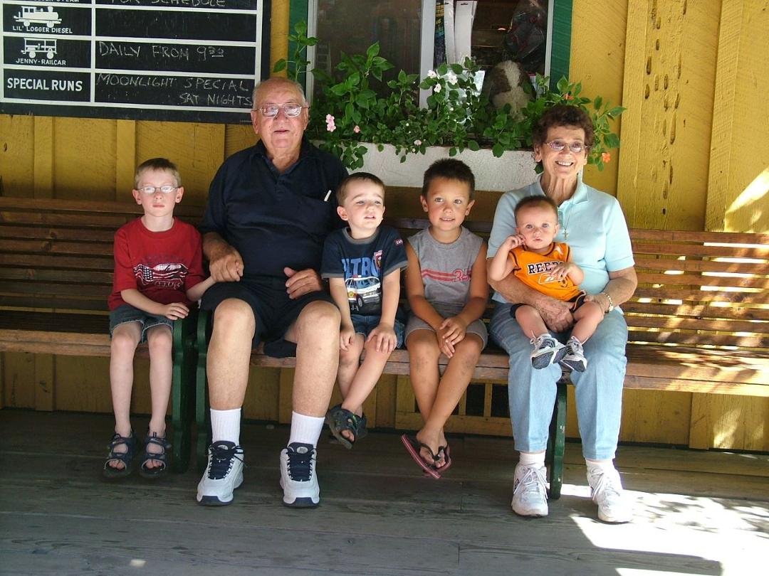Grampy, Nanny, and ALL of the great grand sons to date at the Sugar Pine Logging Railroad outside YOSEMITE... the boys were so very excited... and having their Grampy with them just could not be any better.... Nanny looks p