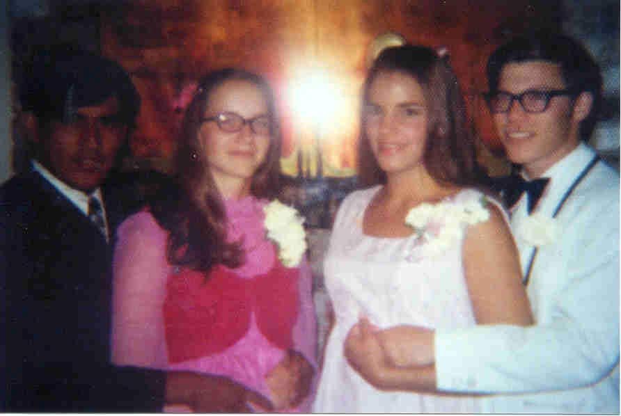 Richard, Kathleen, Reina, and Daniel get ready for the Gold and Green Ball. 4/72.