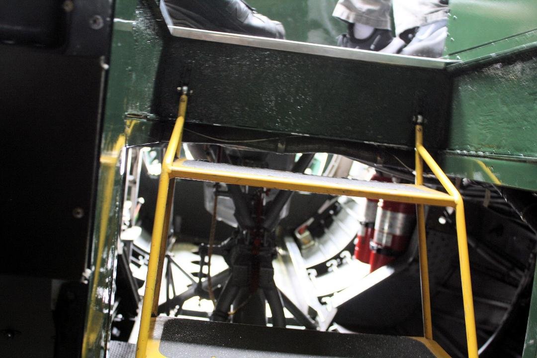 In order for Dad to get to his nose gunner position; you had to lift the steps into the cockpit and crawl through the opening, over the front landing gear and into the nose