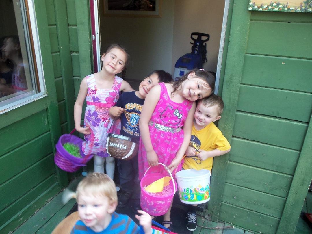 The kids getting ready to go on their egg hunt.
