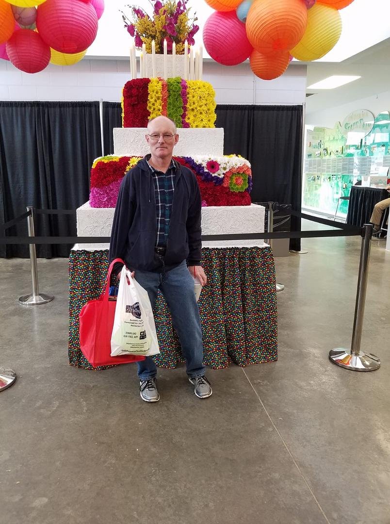 The old guy at the flower and patio show