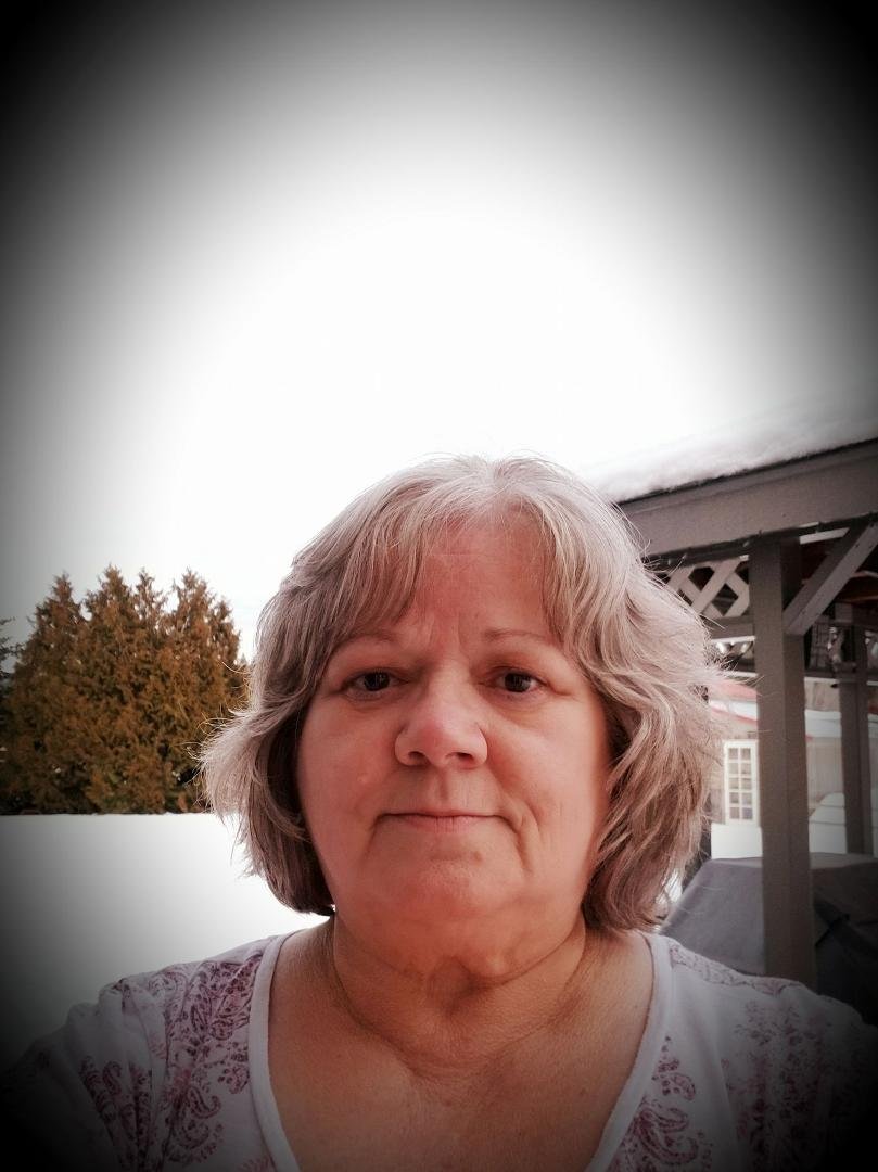 Well I finally went and chopped it all off So here's my new look, and thank you Susan for telling me about your hair salon person, she did a great job, I just love her she is such a sweetheart