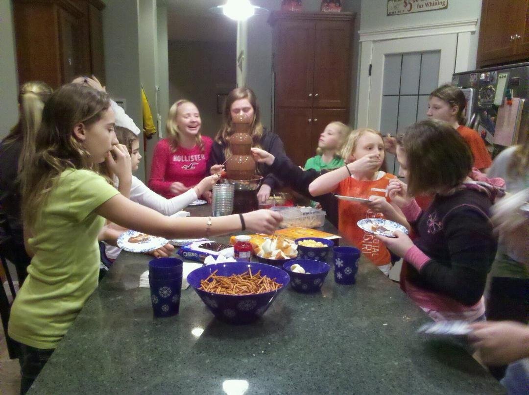 I promised the 9-10 yr girls free relay if they qualified for the state swim meet I would give them a chocolate fountain party. Madi invited all the girls who were at sectionals. 18 girls & 5lbs of chocolate later...a gre