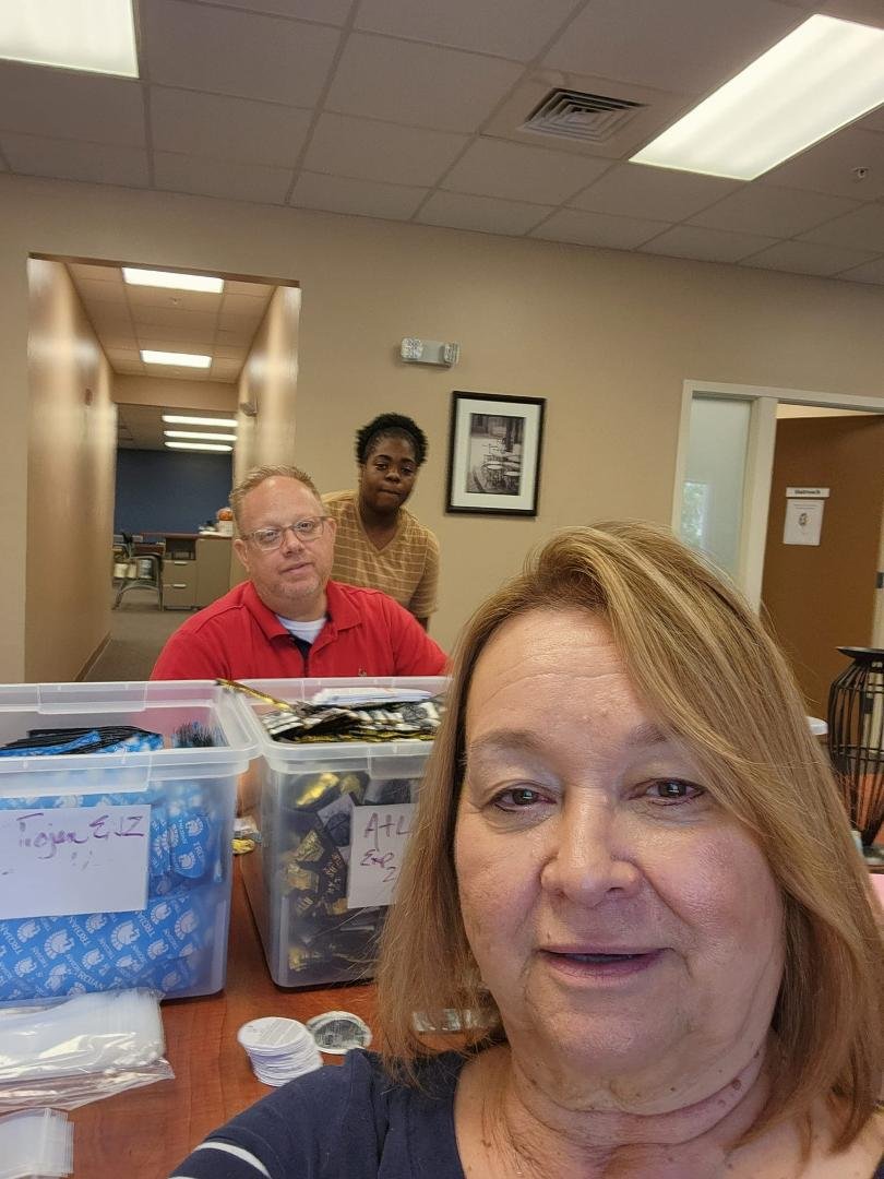 Making condom packets for community distribution with the most awesome outreach team ever! #ADayWithHIV