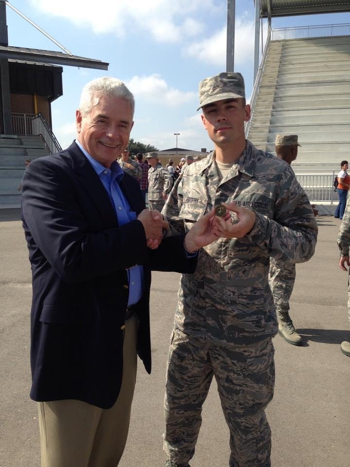 After 8 weeks of schooling on AF regulations and award of "Airmans Coin" Newest Brophy to join Guard is given prestigious Hollywood Guard" ANG Waiver Coin" negating 8 weeks of schooling😃