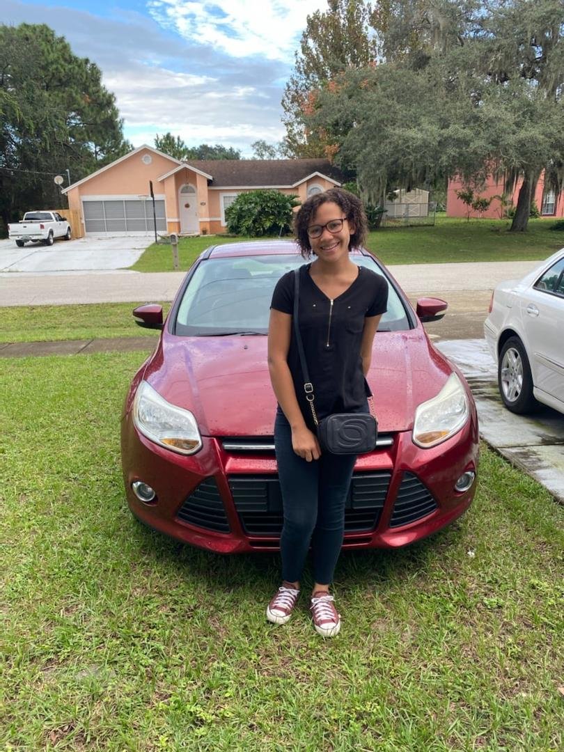 Our daughter, Favor is now a licensed driver. Mom and Dad are proud that she can now drive herself to school.