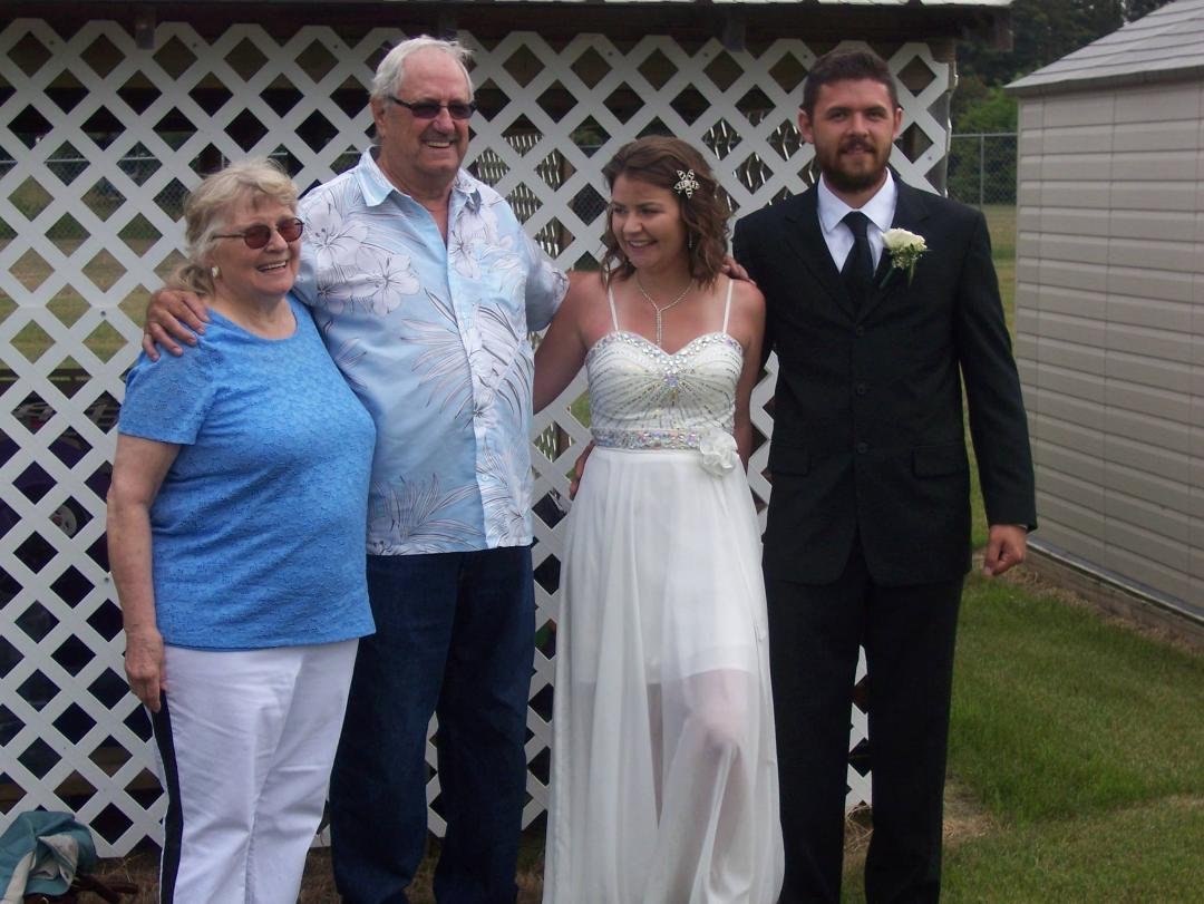 grand daughter sarah and mathew on their wedding day