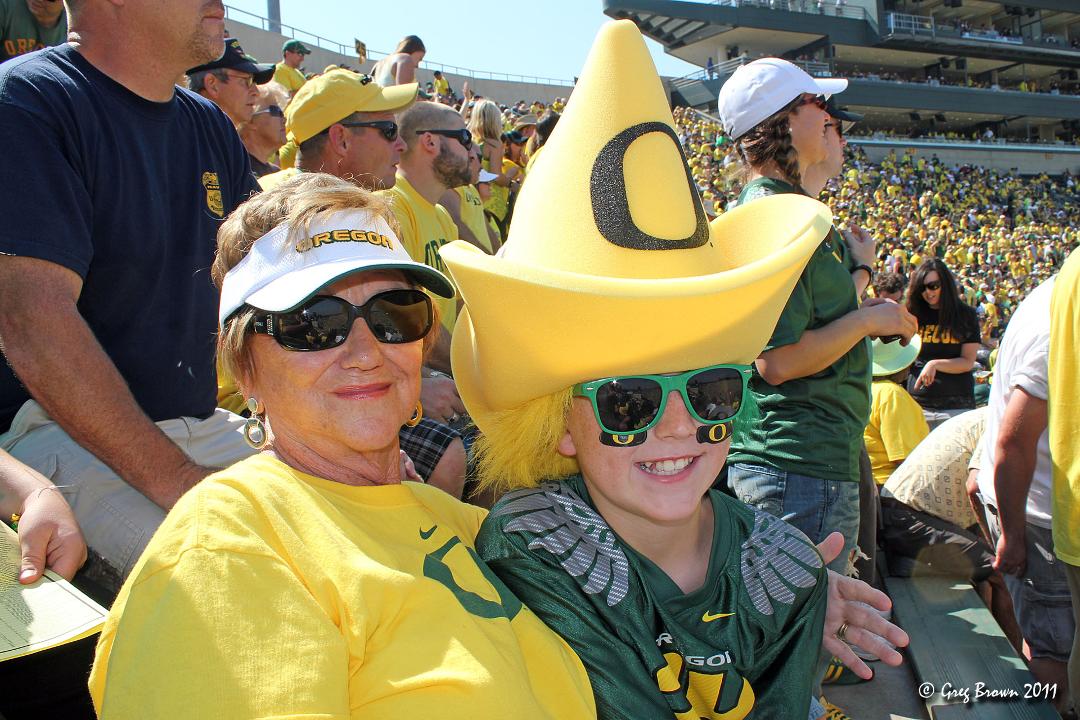 Another photo from the thumb drives - on a really hot day in Eugene, Kirk and his Grandma Pat await the start of the Ducks game. It was an interesting date - 9-10-11.