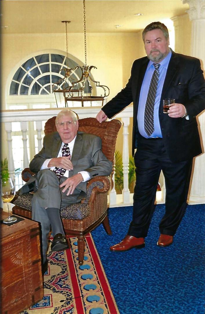What a difference a quarter of a century makes. This is me and my son Bill at a wedding in 2018. Photo taken by the wedding photograper.