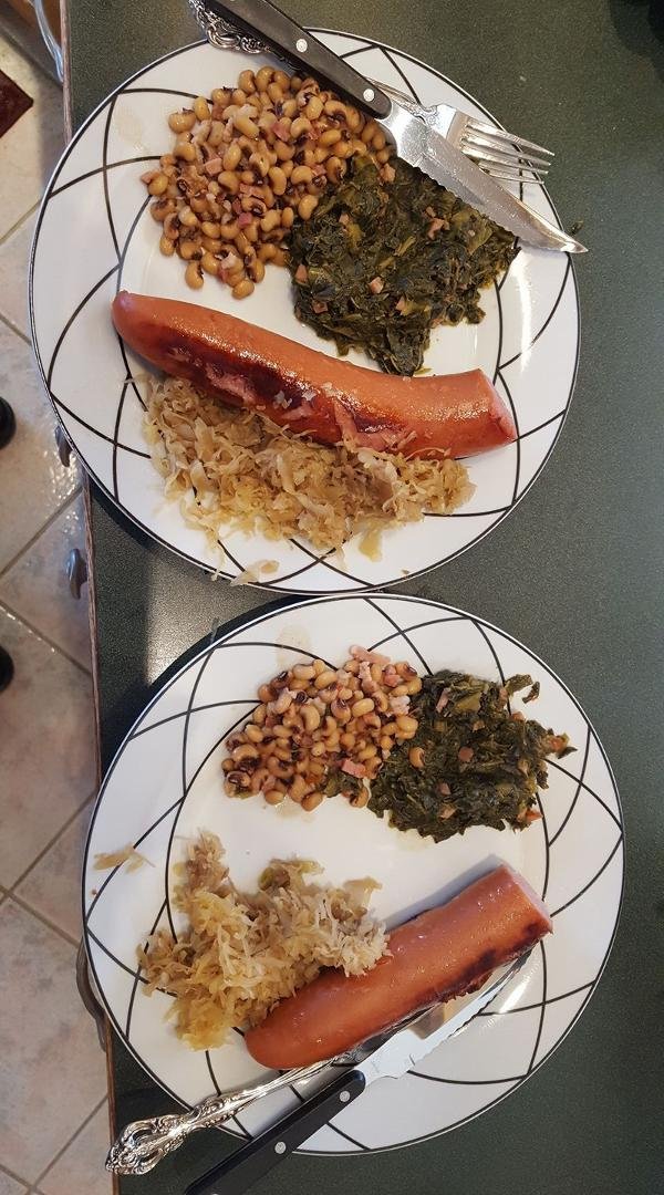 Our traditional New Year's meal. Pork, collards, black eyed peas and sauerkraut. Good fortune for another solar orbit!