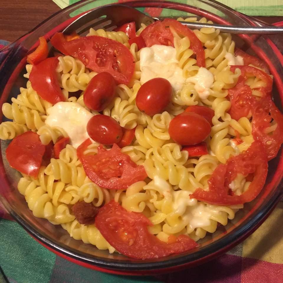 Cameron wanted to make dinner last night himself. We went shopping and he bought fusilli, red peppers, whole mozzarella , pepperoni and tomatoes . He was very specific as to how he wanted to layer his "mozzarella ziti " He