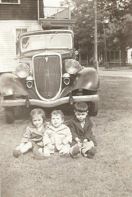 Me on the right, Nancy on the left and Jimmy in the middle at Hollis st in Framingham. We are sitting in front of Dad's car I think. Looks like 1945 or 1946. Can you guess why Jimmy's nickname was "Chubby?"