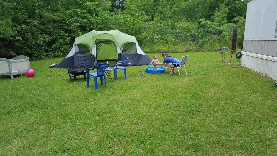 Camping out at our favorite Campground our front yard on Mother's Day . Savannah roses first camping experience