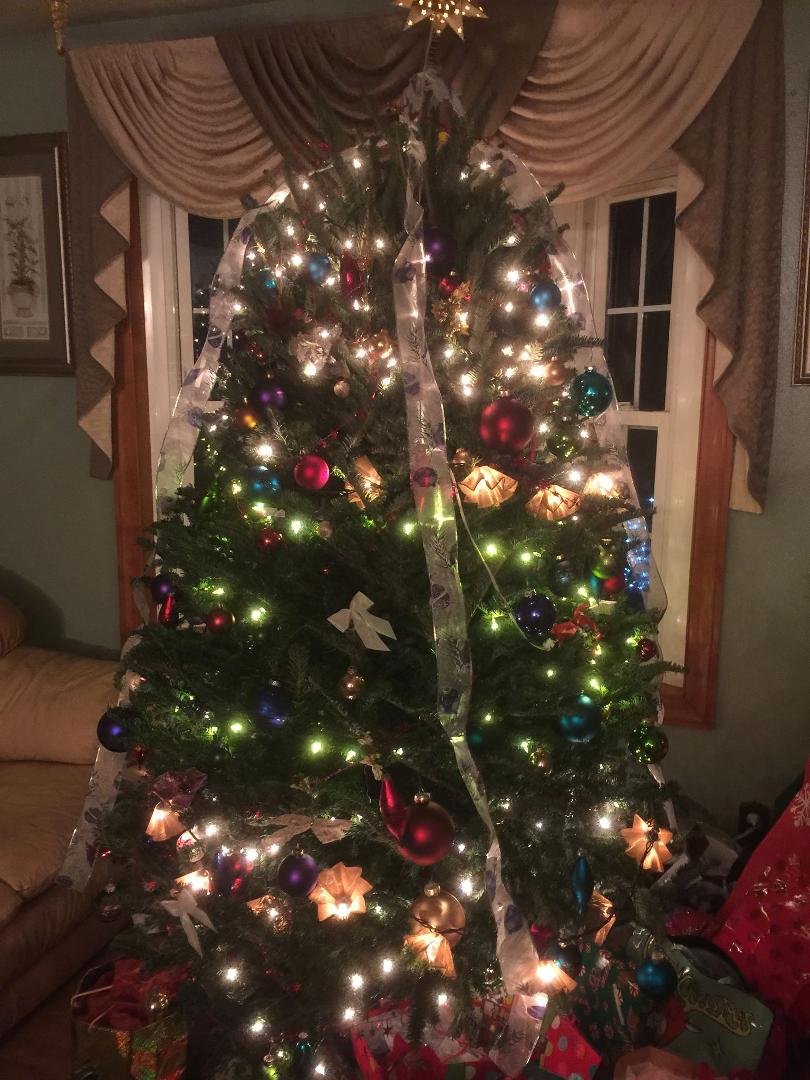 The tree decorated by 5 grandkids!! Not bad