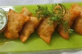 I must admit ... I make a mean samosa. It's all in the dough. This is one of the few ways I can get Diane to eat her peas.