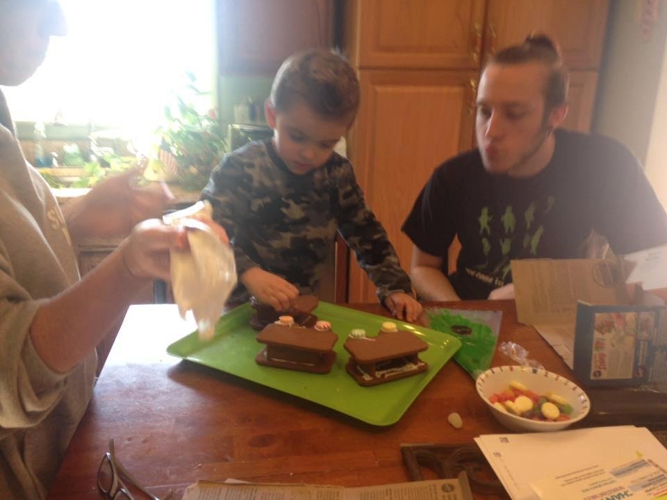 Joey and Michael decorating his ginger bread train had so much fun with this little man and his sister Lexie