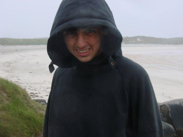 I am at Dogs Bay Beach in the rain.