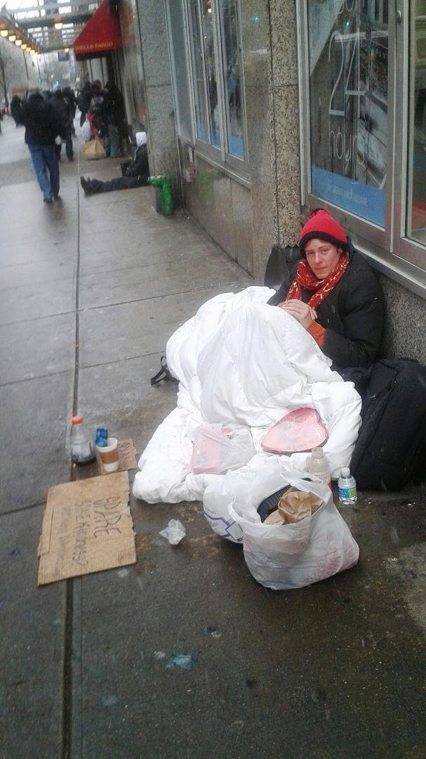 I saw this homeless woman on 14th Street in Manhattan with two boxes of Valentine day candy. I asked her where she was from--she said Chicago--the city where I was born. I told her I hoped things would get better. She agree