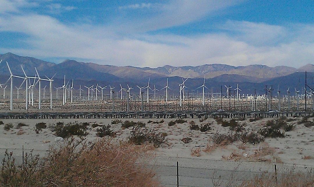 There are literally fields with hundreds of wind turbines and solar panels in the Coachella Valley/Palm Springs, CA, area, generating power for everything and everyone in this part of the State ... and we thought our three 