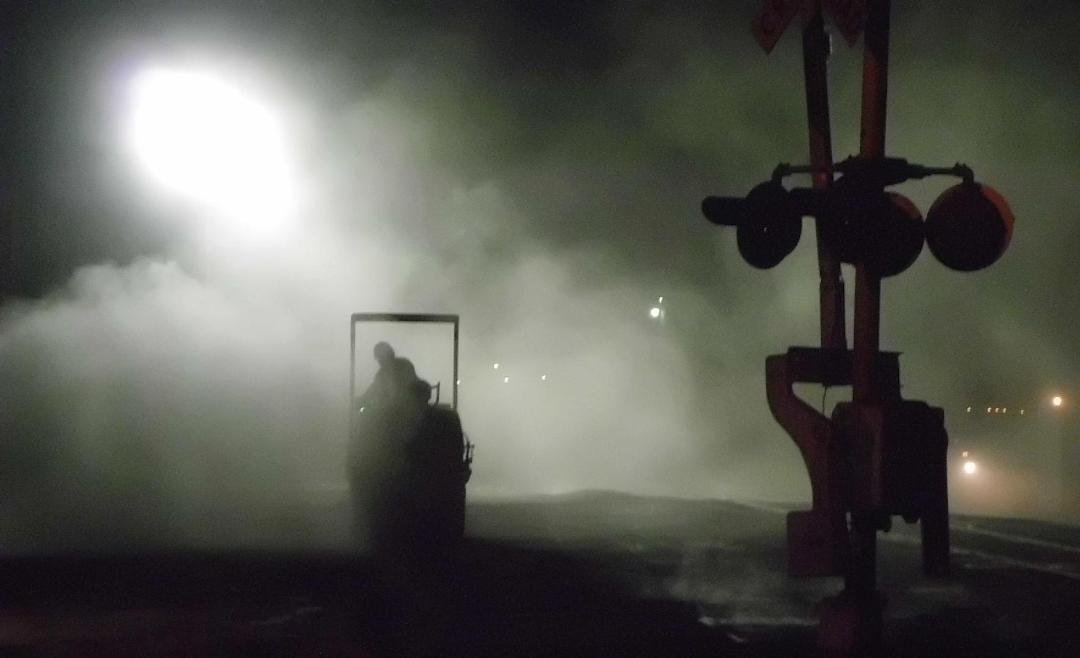 Night Roller - While working on the High Speed Rail project I caught this shot of a pavement roller with work light and a dust clould. 2012\r\n\r\npoint & shoot