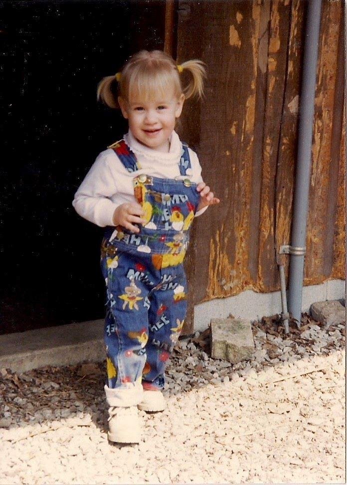 This is Renee at 2 years old at Camp! Love the hair! She is so cute !