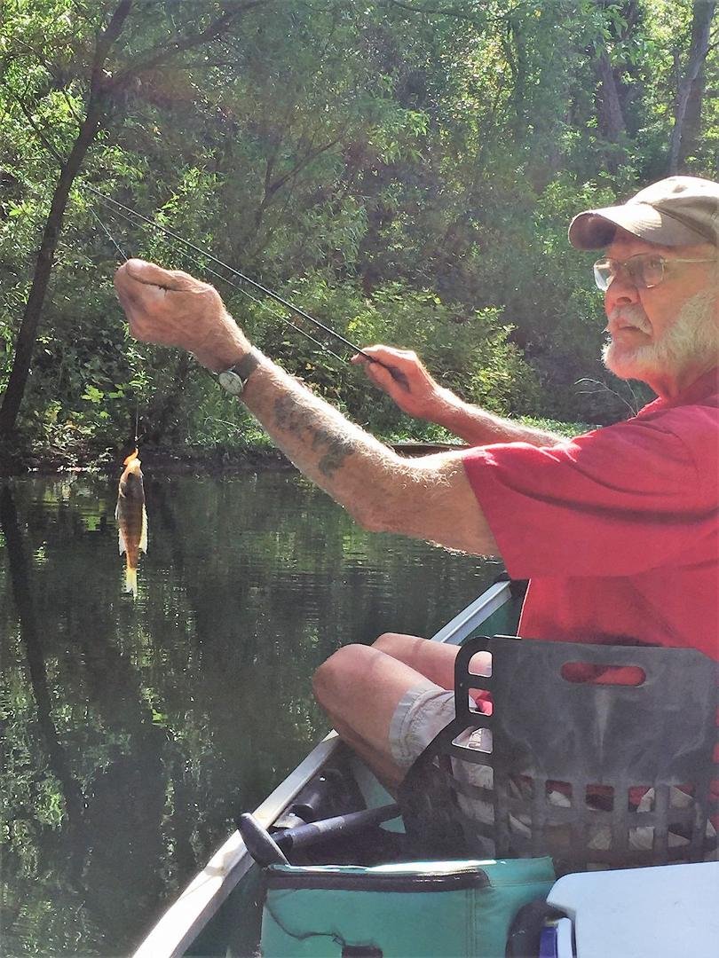 Spent the day fishing with a friend. He caught the first fish, the biggest fish, and the most fish. Here he is with them all.