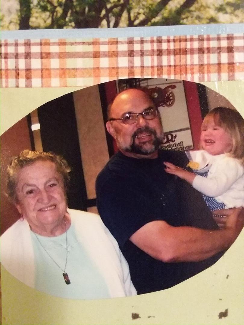 A picture 8-9 years ago. Audrey a month after her birthday with G. Dan & Mom Luisa. How time flies!