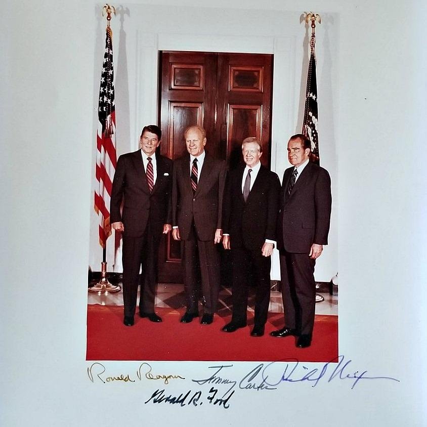 In going through boxes this afternoon, I found this photo print with original signatures of these four U.S. Presidents. There were a limited number signed to commemorate attendance at an event. I don't have time to research