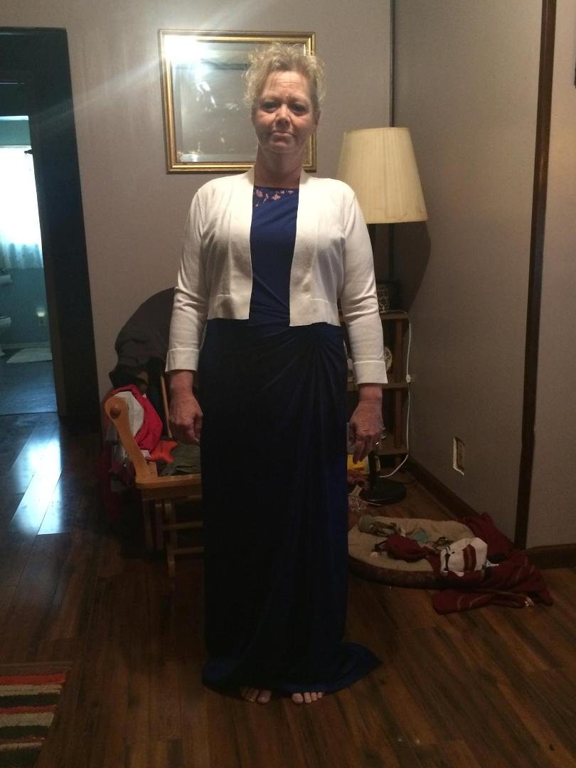 Wedding dress to see if it fits right.