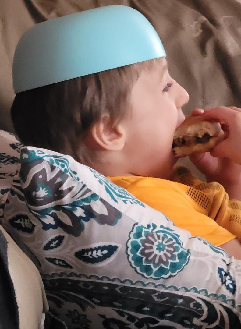 Jude is something else. Eating a cheeseburger and the bowl I put it in he put on his head for a hat. He had to have a pre-nap snack.