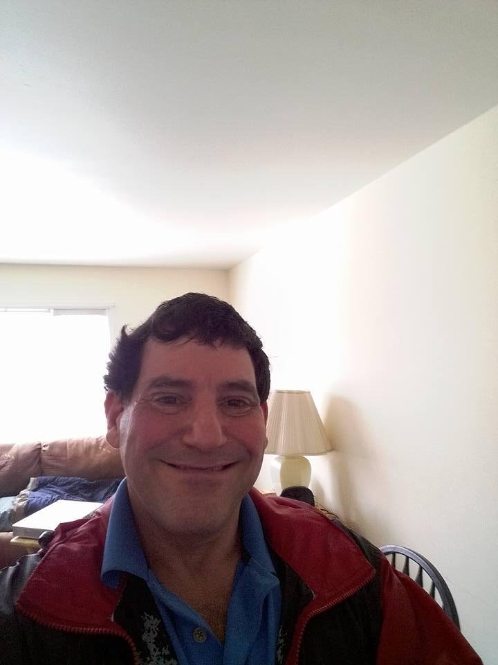 Taking photo of myself on my new laptop