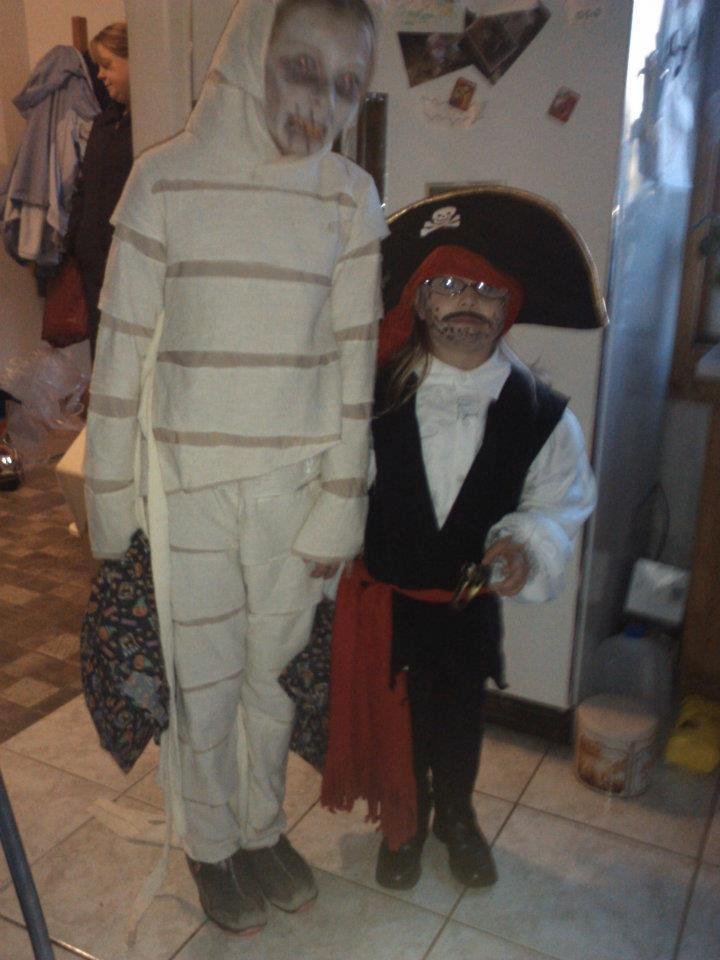 They looked sooooo sweet earlier this afternoon . . . . . ghouls and pirates when darkness falls !