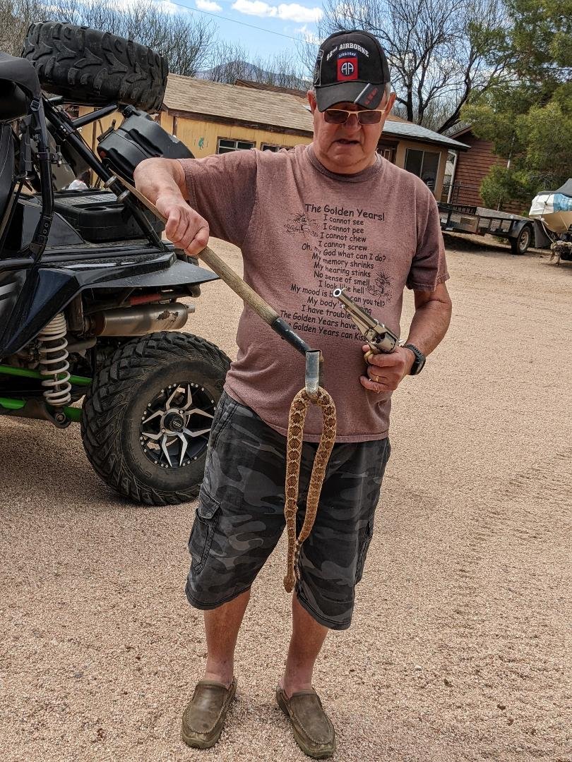 Ken got to shoot his first rattlesnake this year.