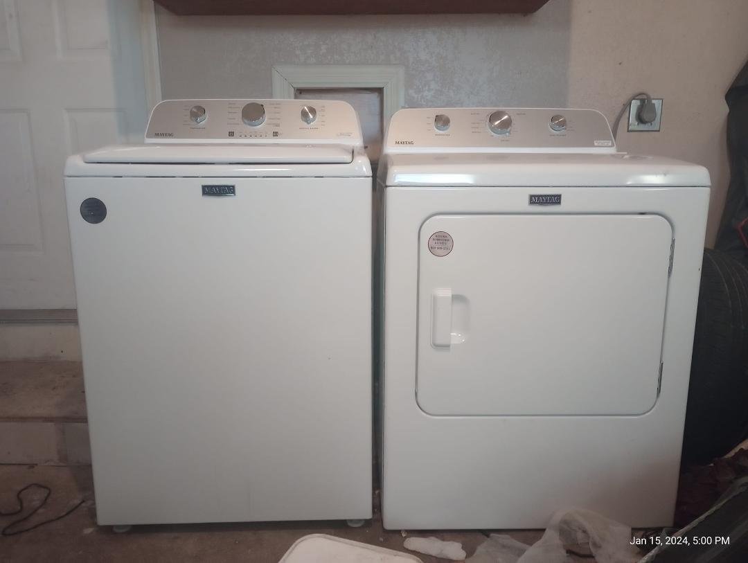 Maytag washer and dryer set for sale at $600. Large capacity self leveling top loader washer. Got in mid June 2023 only 1 years old and runs great. Have to come pick up if wanted.